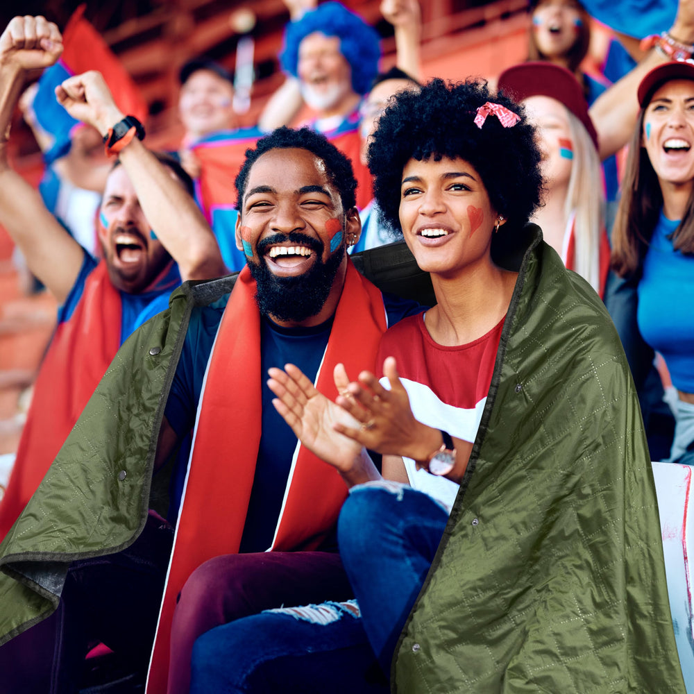SUN CUBE concert-ready blanket folds with strap for easy carrying.