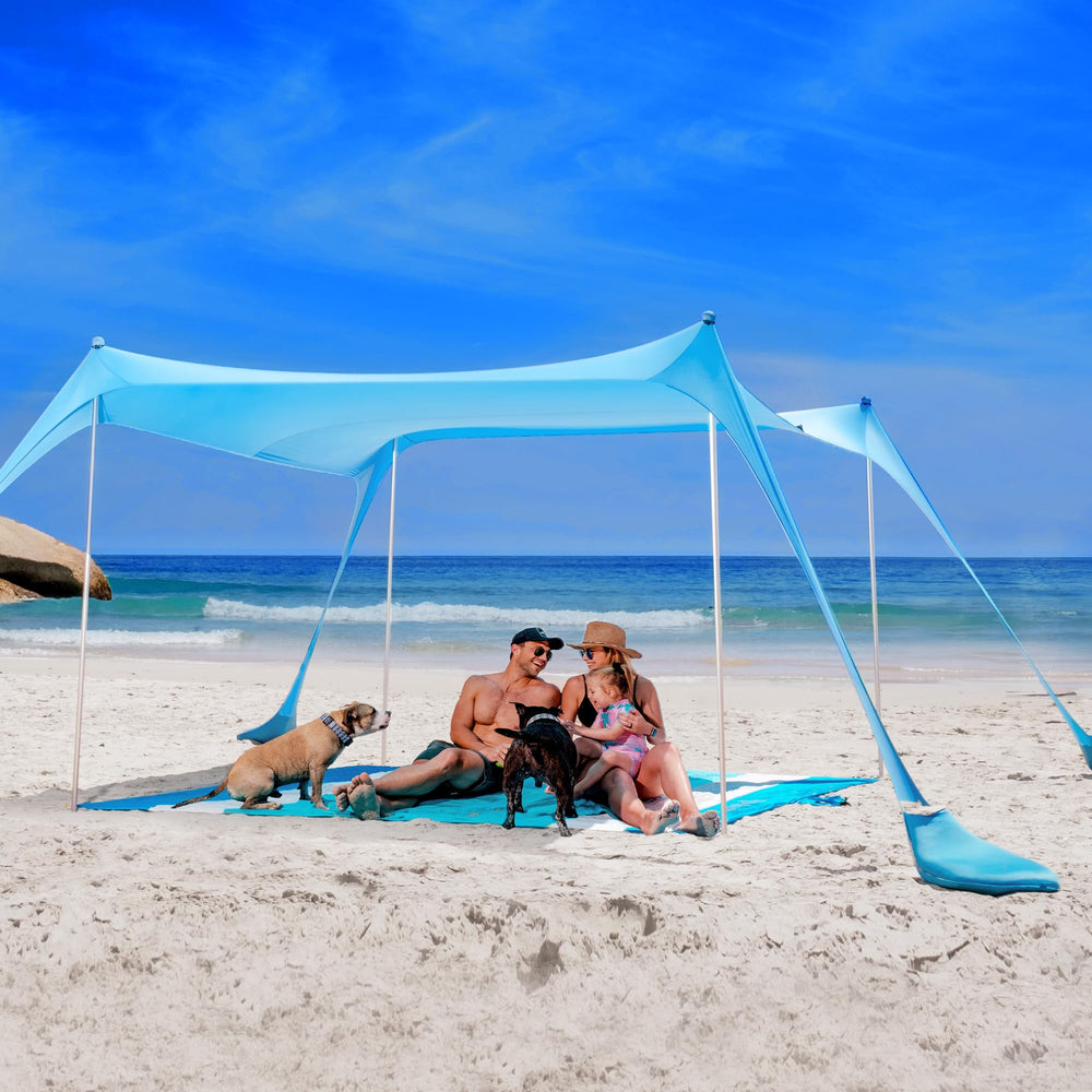 Sun Ninja Beach Shade on Beach demonstrates quick setup for sunny shore days.