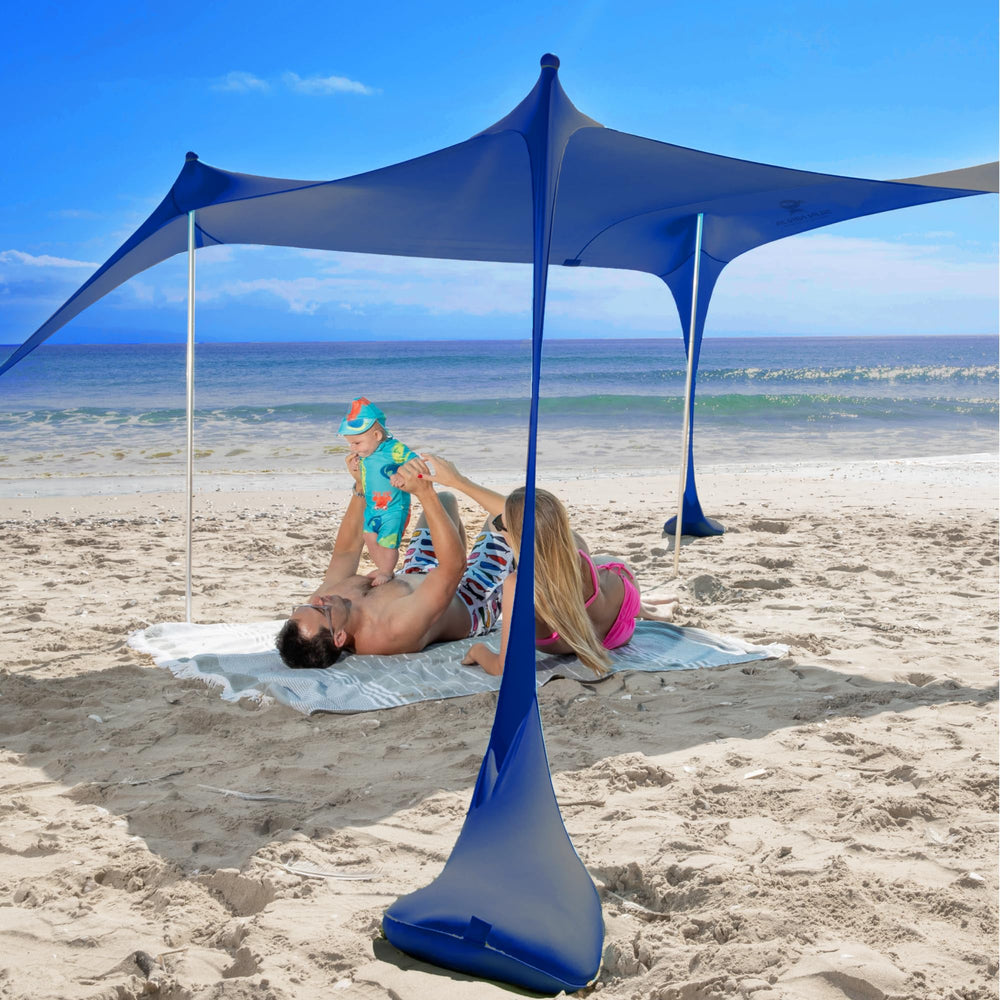 SUN NINJA Beach Tent sand stability with anchors for windy shoreline days.