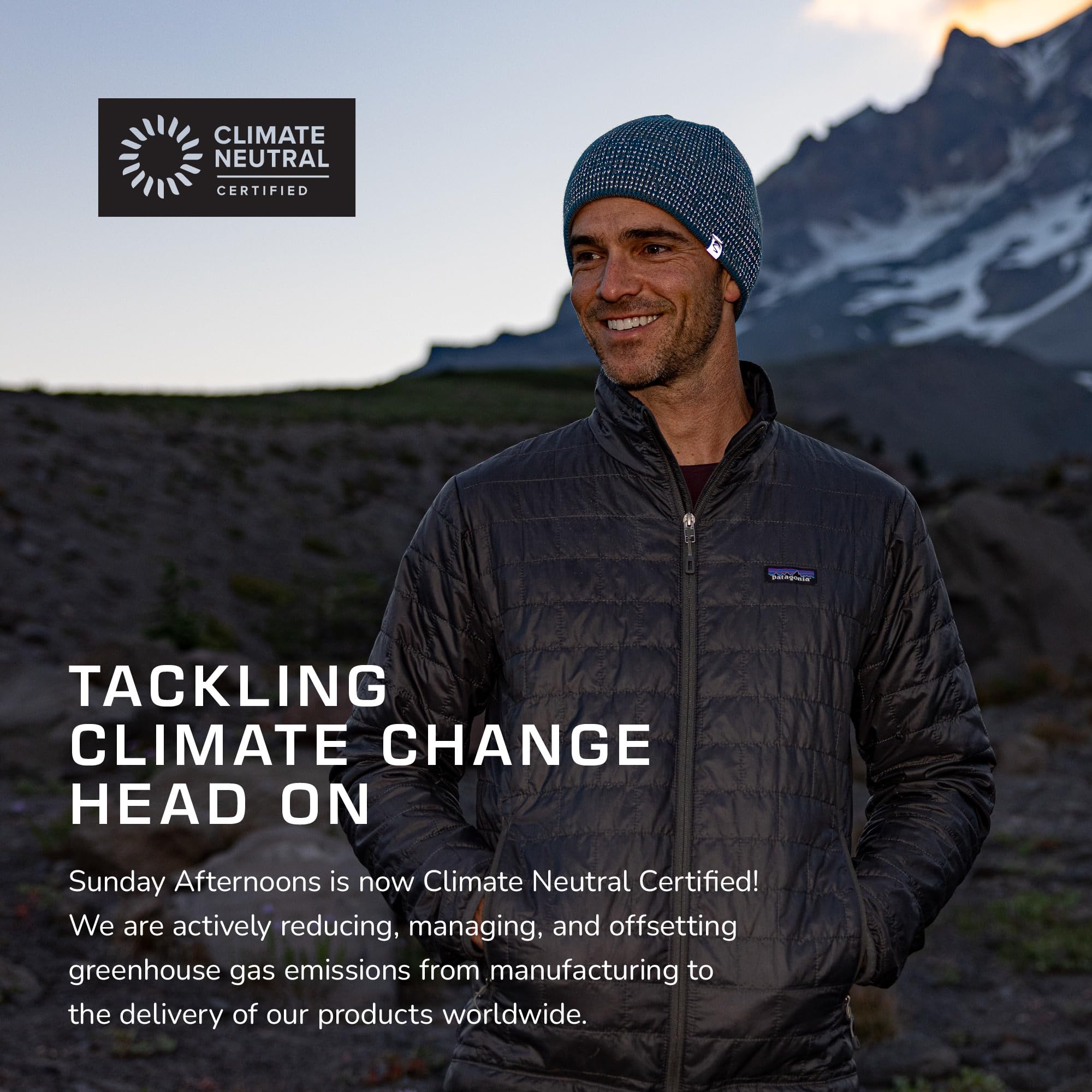 Reversible beanie showing exterior heather and solid interior
