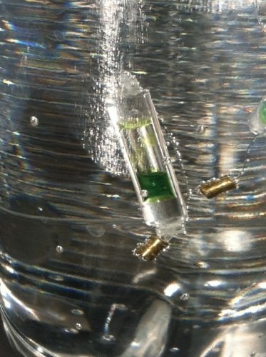 Sunflair WAPI indicators in close-up show pasteurization cue for hiking water