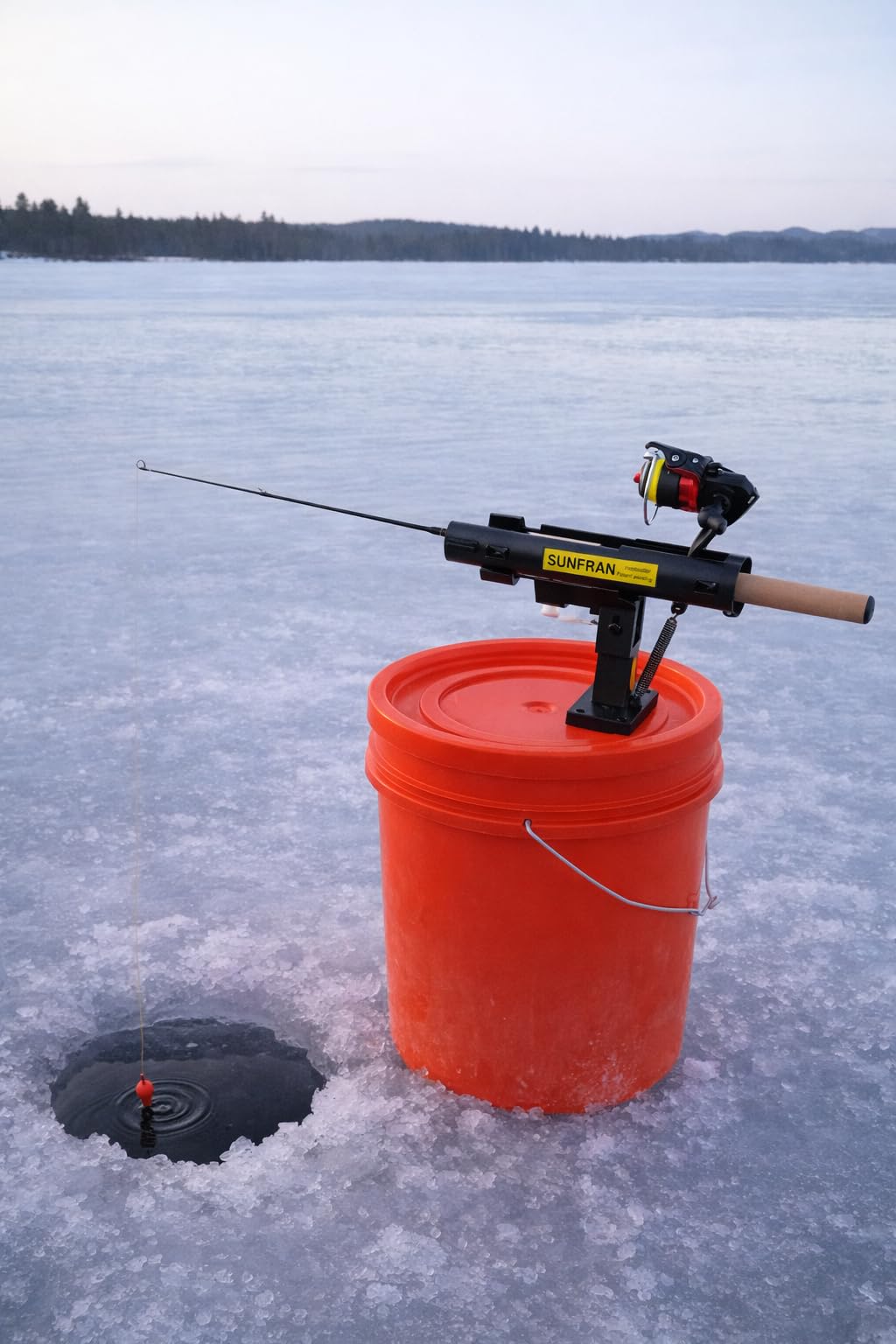 SUNFRAN Hooksetter setup on a bucket lid with a single 1/4 inch hole for easy transport.