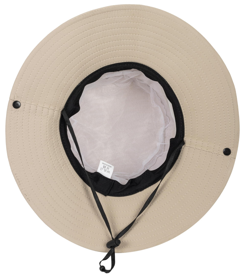 Model wearing dark beige sun hat during outdoor hike