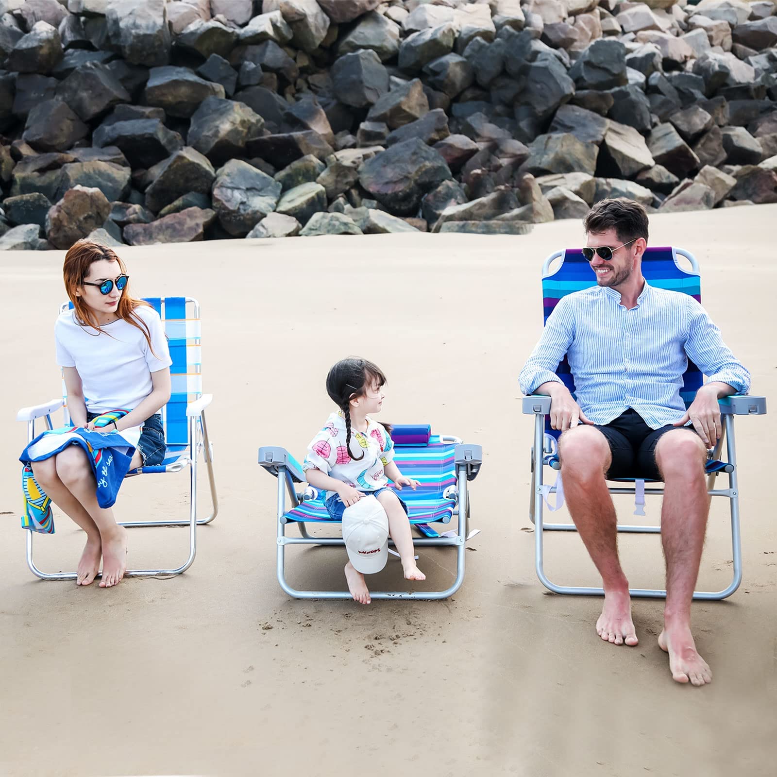 SunnyFeel Extra Wide 28-inch Low Beach Chair with foam pillow provides neck comfort during sun breaks.
