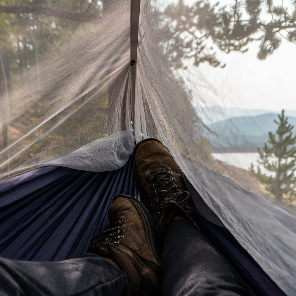 Sunyear hammock with net highlights spacious lounging for reading or napping