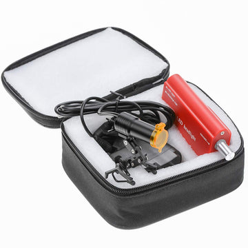 Superdental dental head light packaging bag with accessories.