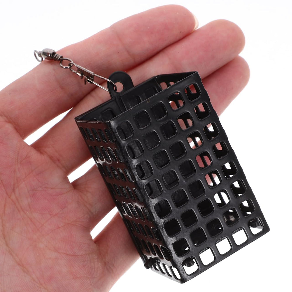 Hollow iron bait cage showing water entry and bait release