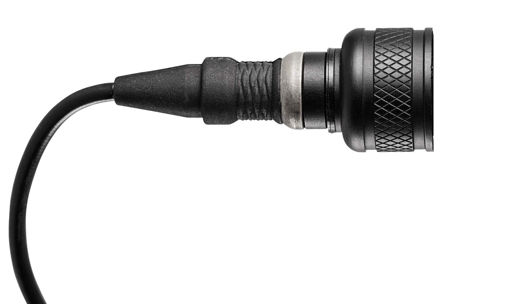 SureFire rear cap close-up showing waterproof housing and lock-out feature