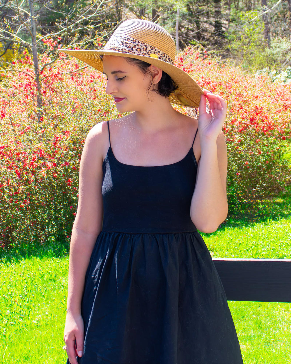 Surell leopard bow detail enhances outfit while keeping sun at bay.