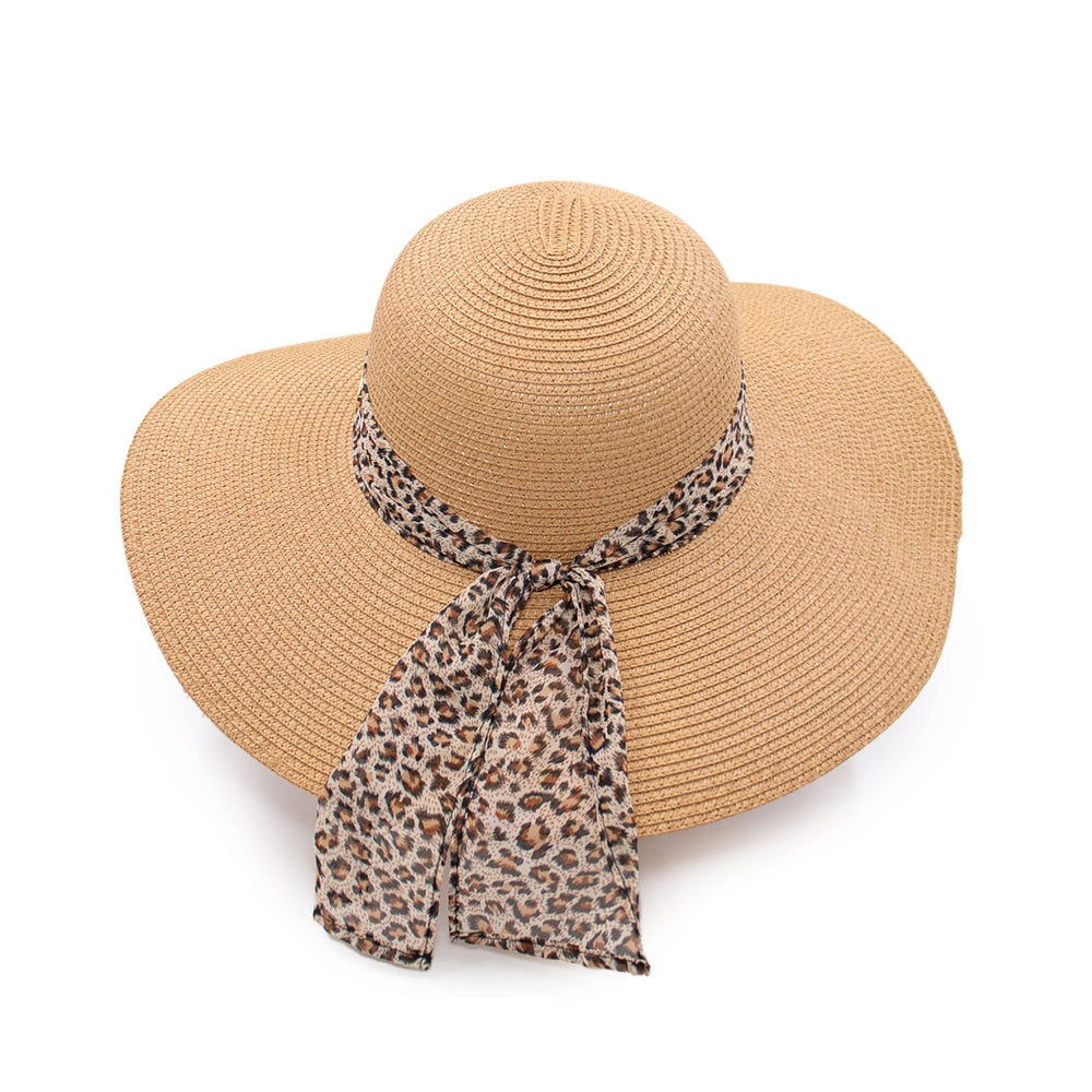 Surell summer straw hat with leopard bow offers stylish shade for sunny beach days.