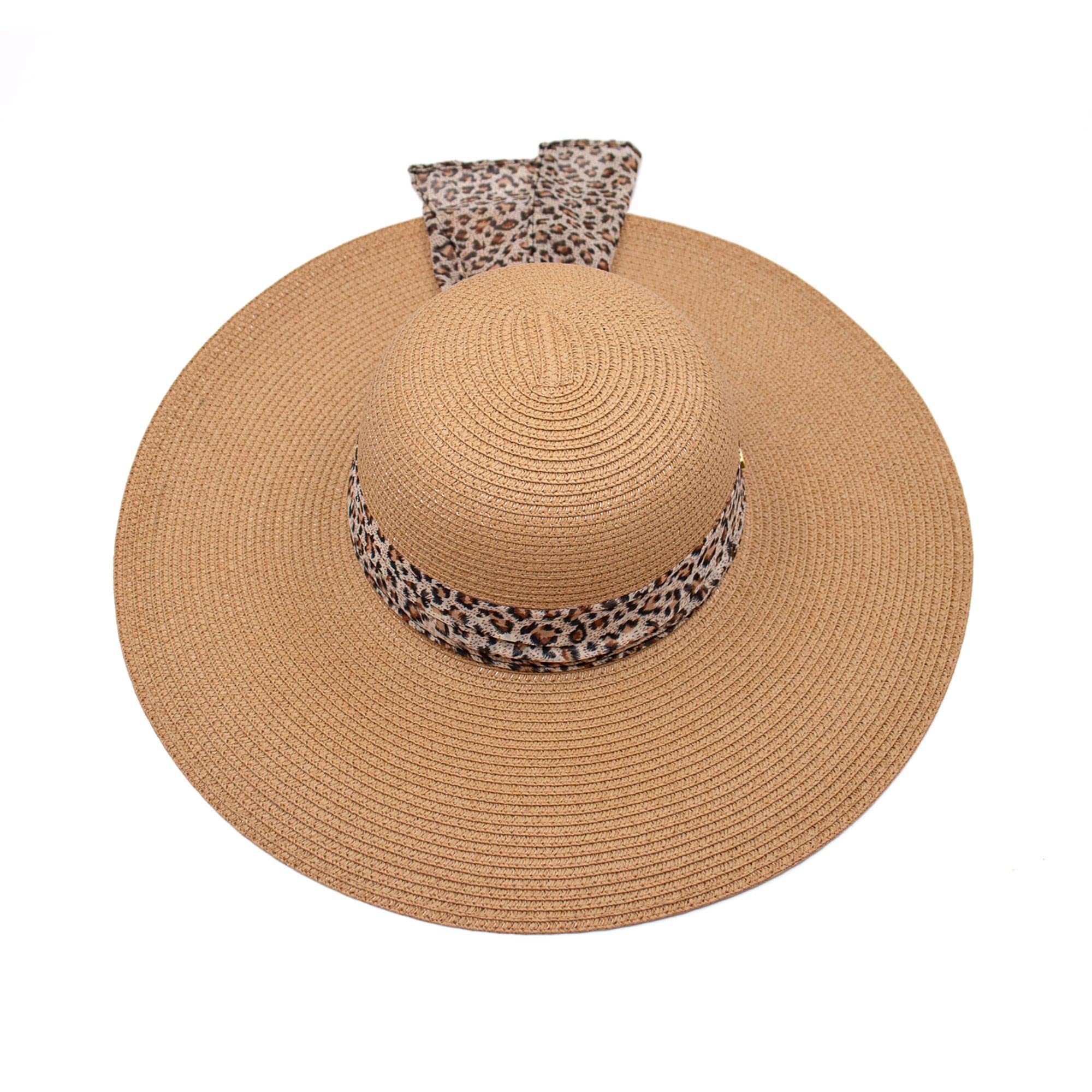 Surell wide-brim hat pairs with swimsuits, dresses, and casual looks.