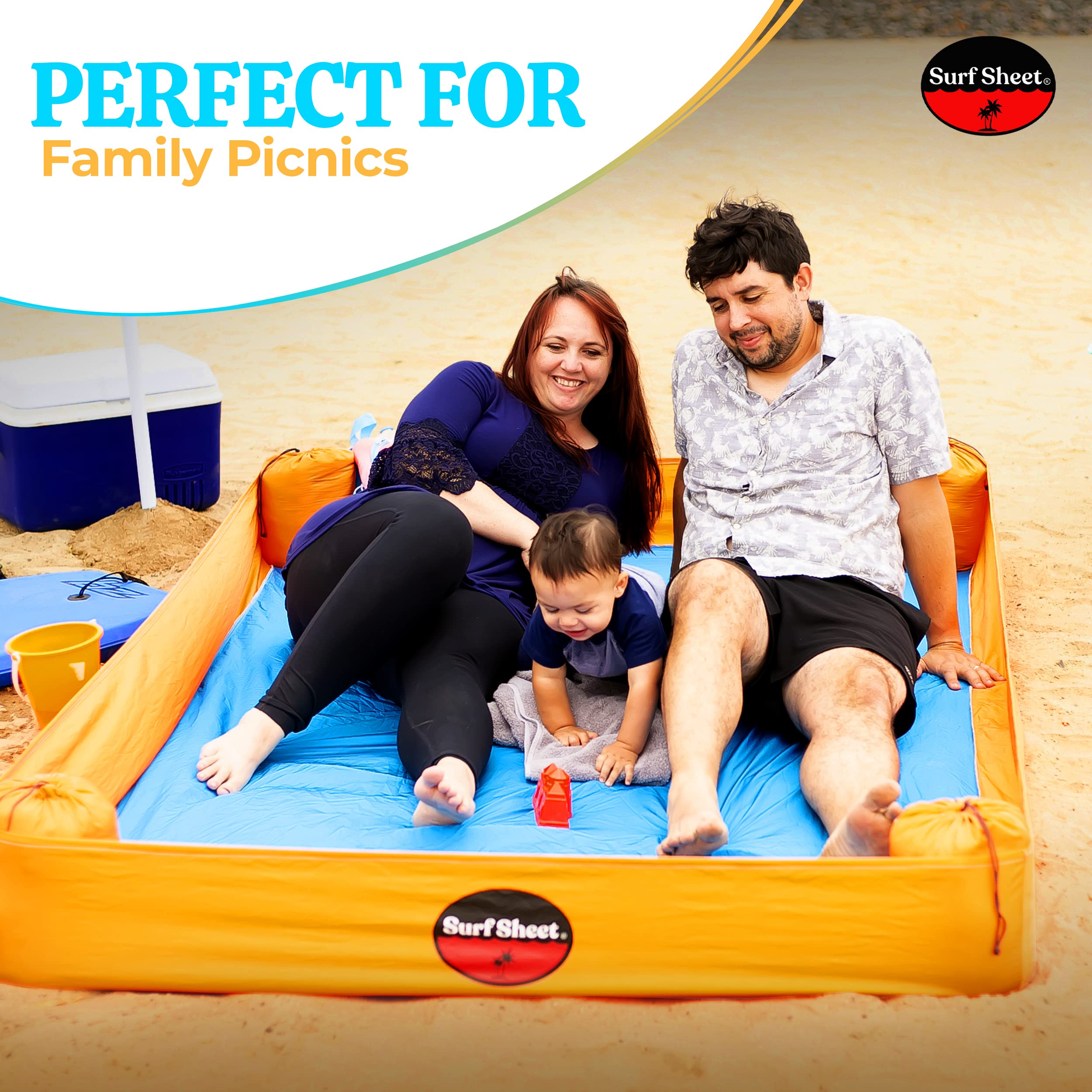 Surf Sheet anchored beach blanket with sandbags for stable, secure setup.