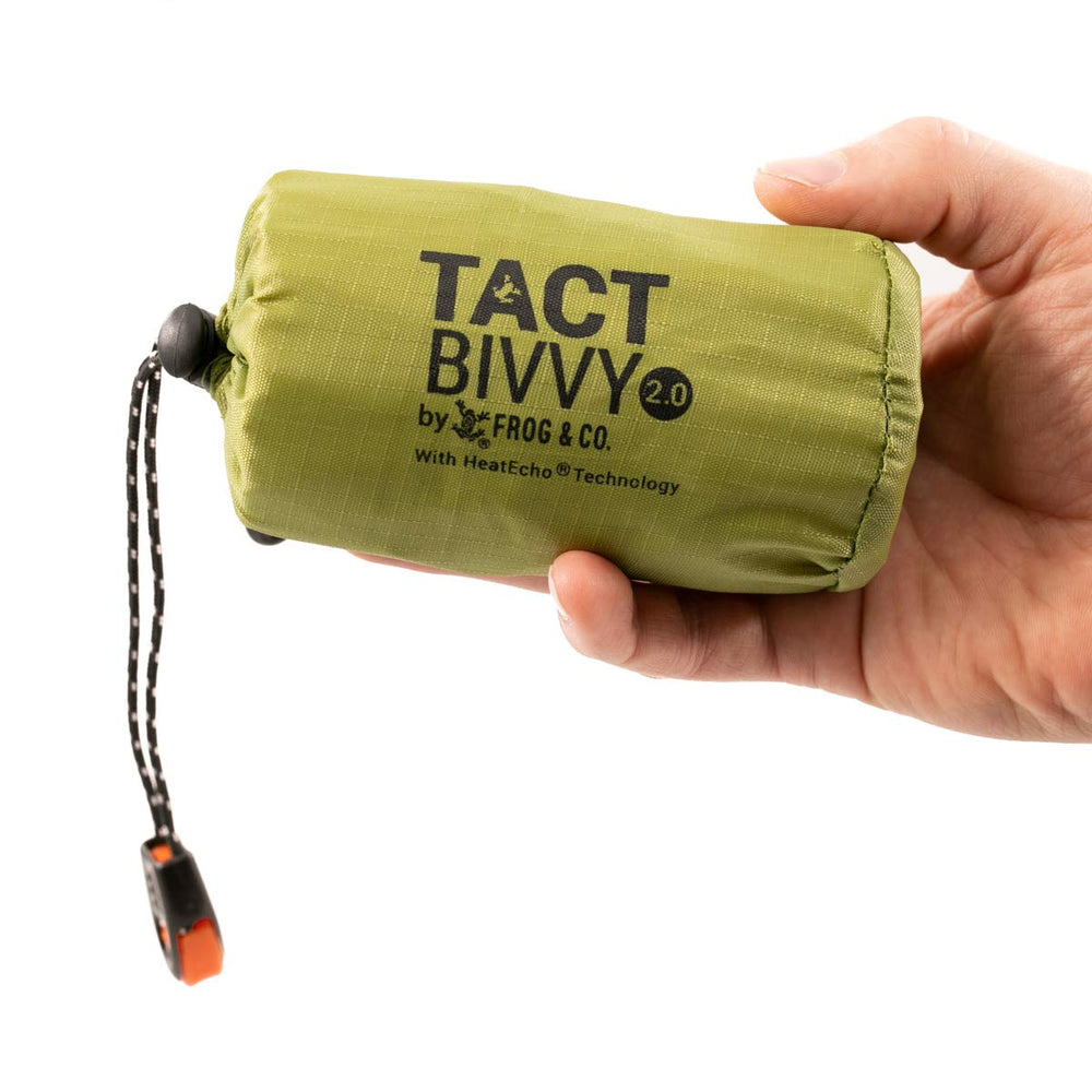 Survival Frog Tact Bivvy HeatEcho compact sleeping bag in pack sleeve for quick access.