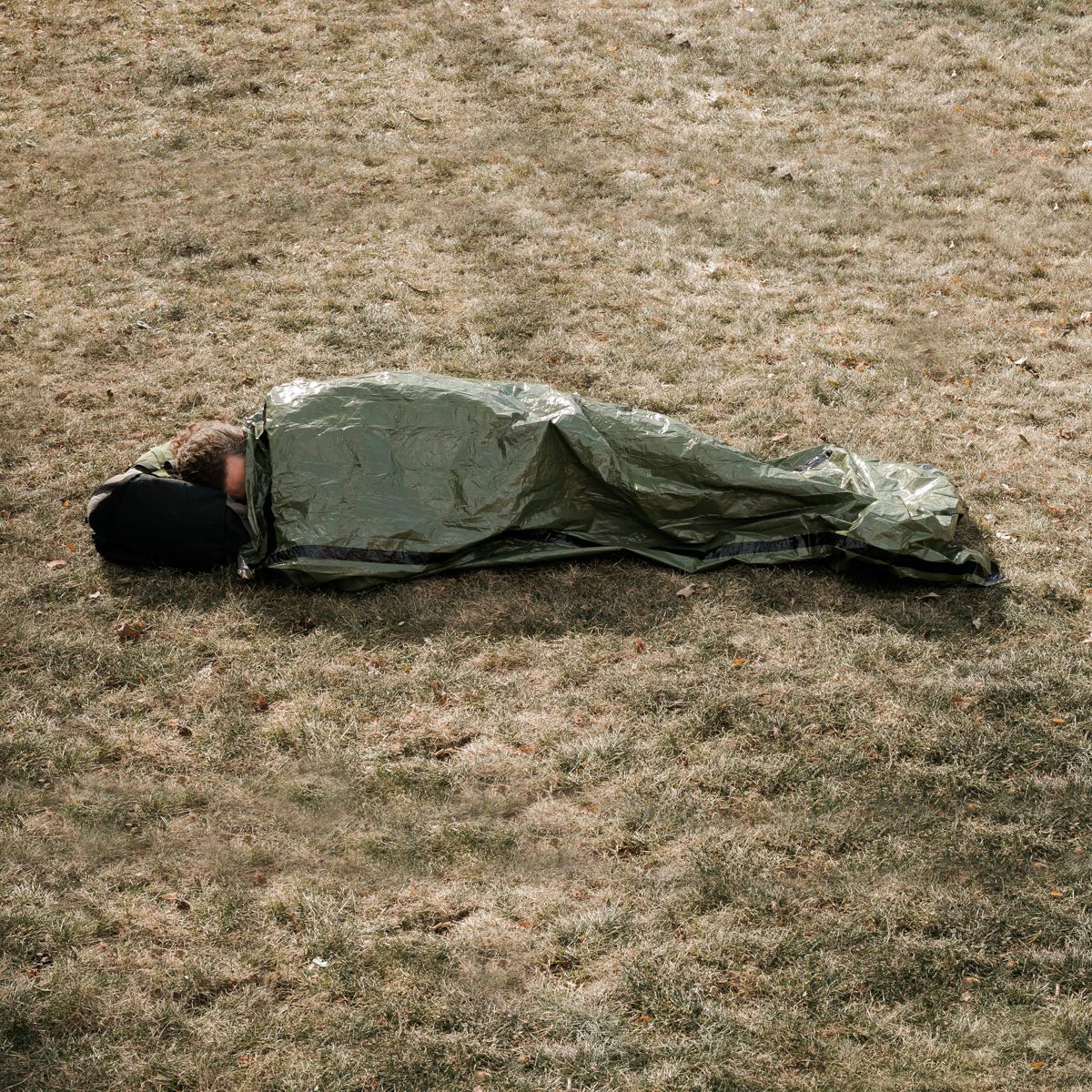 Survival Frog Tact Bivvy sleeping bag liner used to boost warmth inside shelters.