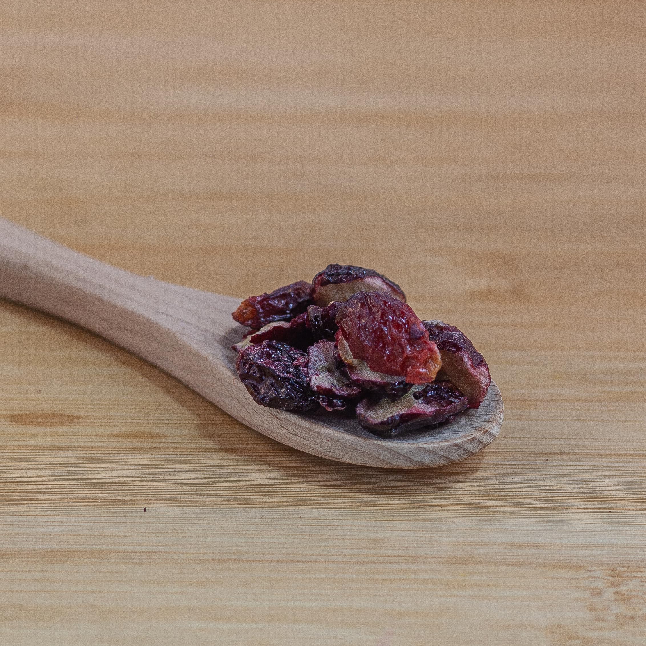 Close-up of freeze-dried grape halves showing crunchy texture and color