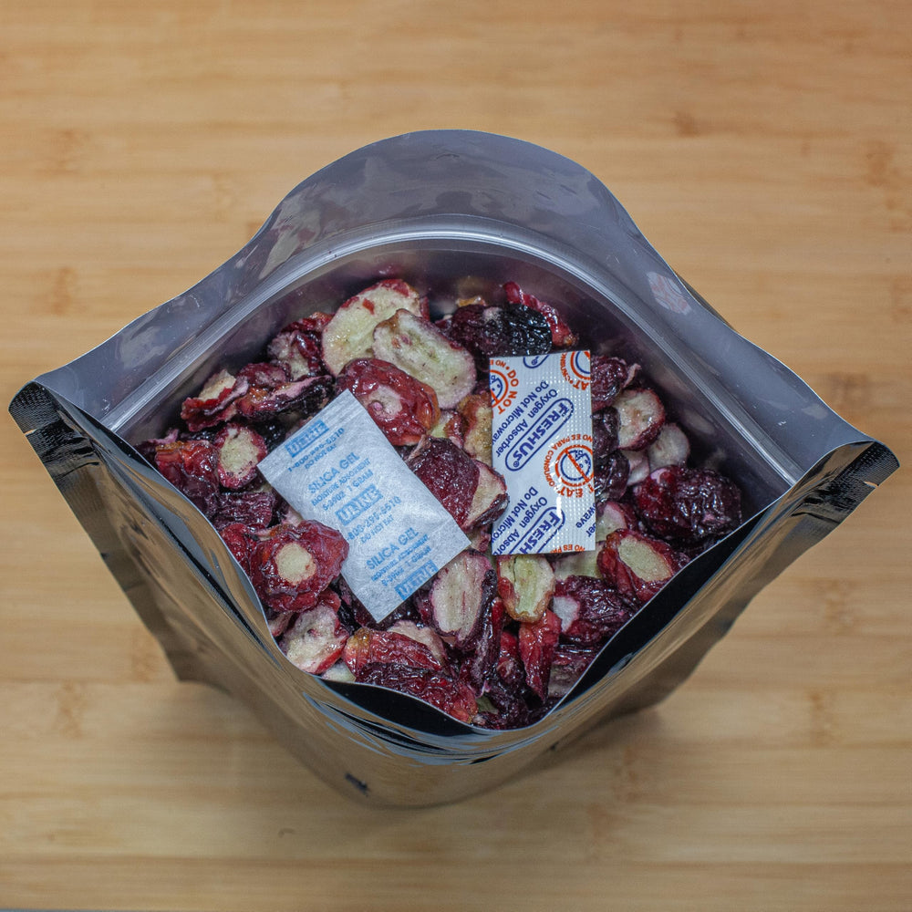 Grape halves sprinkled over yogurt for a crunchy topping
