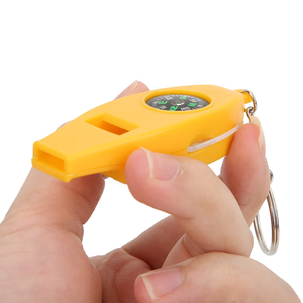 4-in-1 Survival Whistle for camping, hiking, and climbing.
