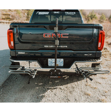 Center arm folds down for rear access with Swagman XTC2 mounted on car.
