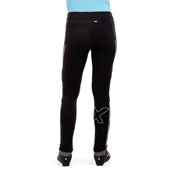 Swix Delda softshell tights in black, in action, ideal for versatile training sessions.
