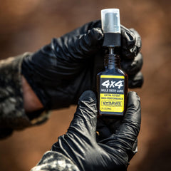 Close-up of synthetic estrus scent 4x4 lure label