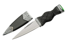 Close-up of sgian-dubh handle showing emerald-colored pommel and metalwork