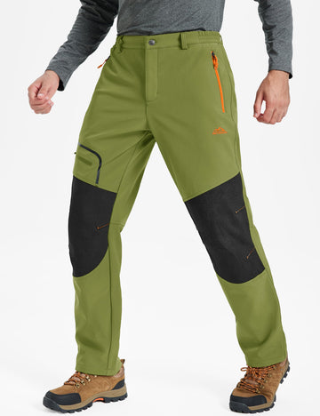 TACVASEN men's snow pants side view highlighting windproof performance and mobility.