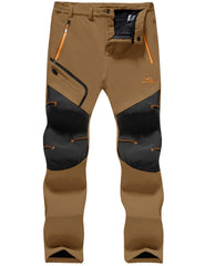TACVASEN Snow Pants waterproof outer fabric blocks wind, keeping you warm in snow.