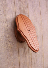 The Taxidermists Woodshop face plate shows solid oak craftsmanship for durable trophy display.