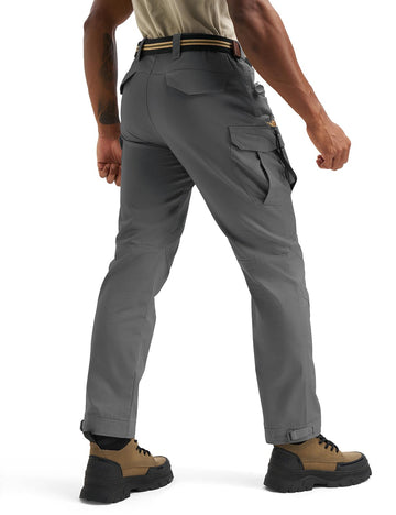 TBMPOY dark grey tactical pants on rugged terrain for work and hikes