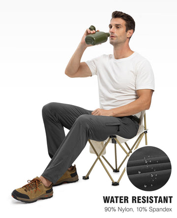 TBMPOY men's hiking pants in action demonstrate water resistance on wet trails.