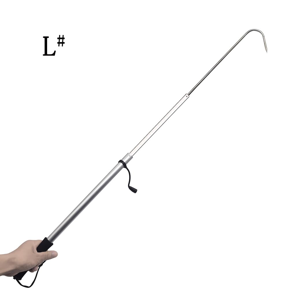 Telescopic gaff in use for landing a fish in saltwater