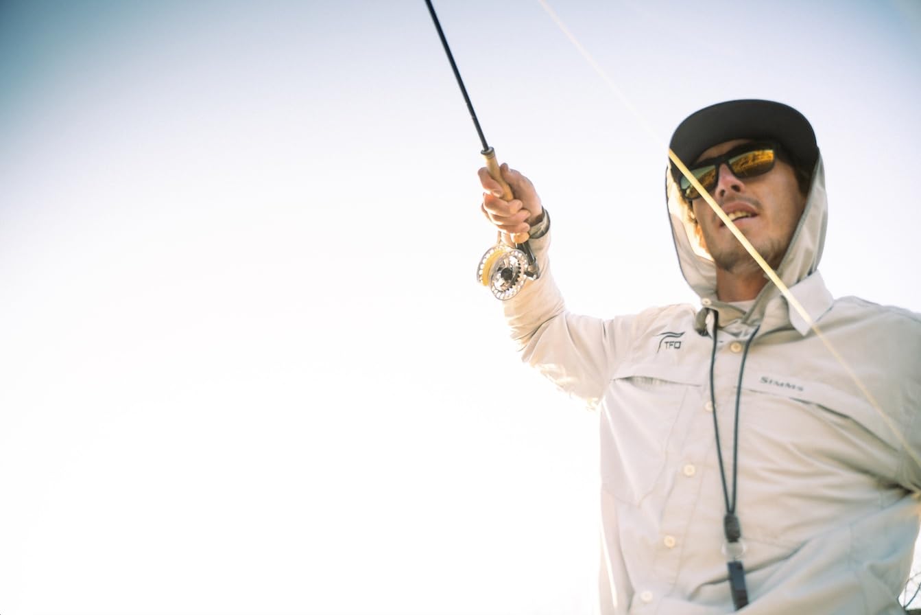 Temple Fork Outfitters Blue Ribbon rod 4wt-10ft-4pc in hand for precise dry fly casting.