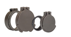 Tenebraex front flip cover assembly guarding ocular lenses against debris in rugged field conditions