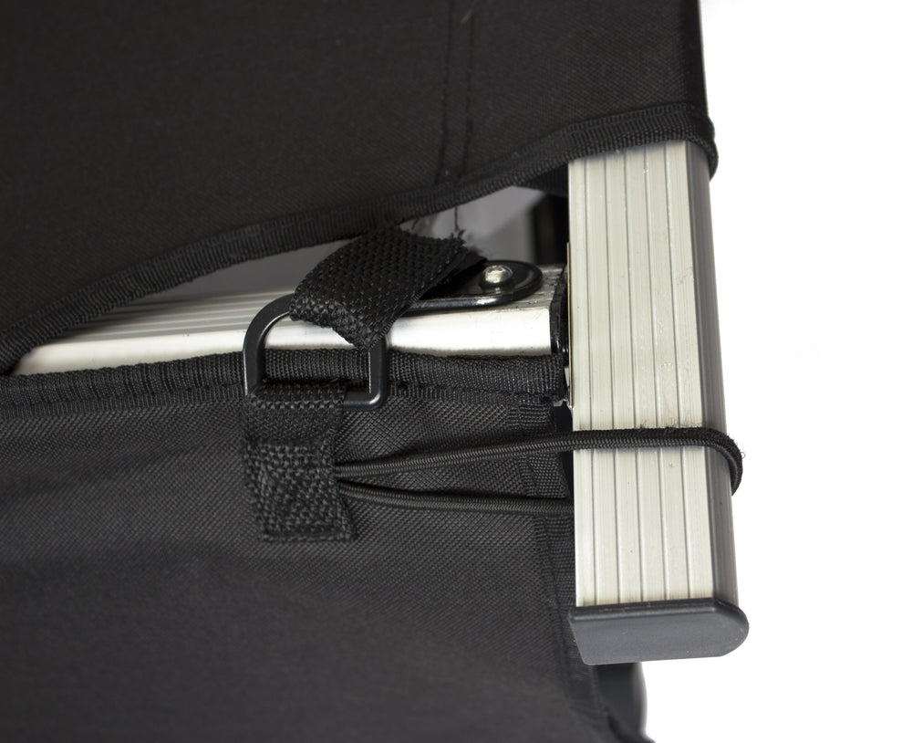 TETON cot organizer with extra-large pockets for books, snacks, and gear.
