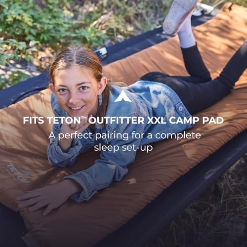 TETON Outfitter XXL camping cot highlighting pivot arm feature.
