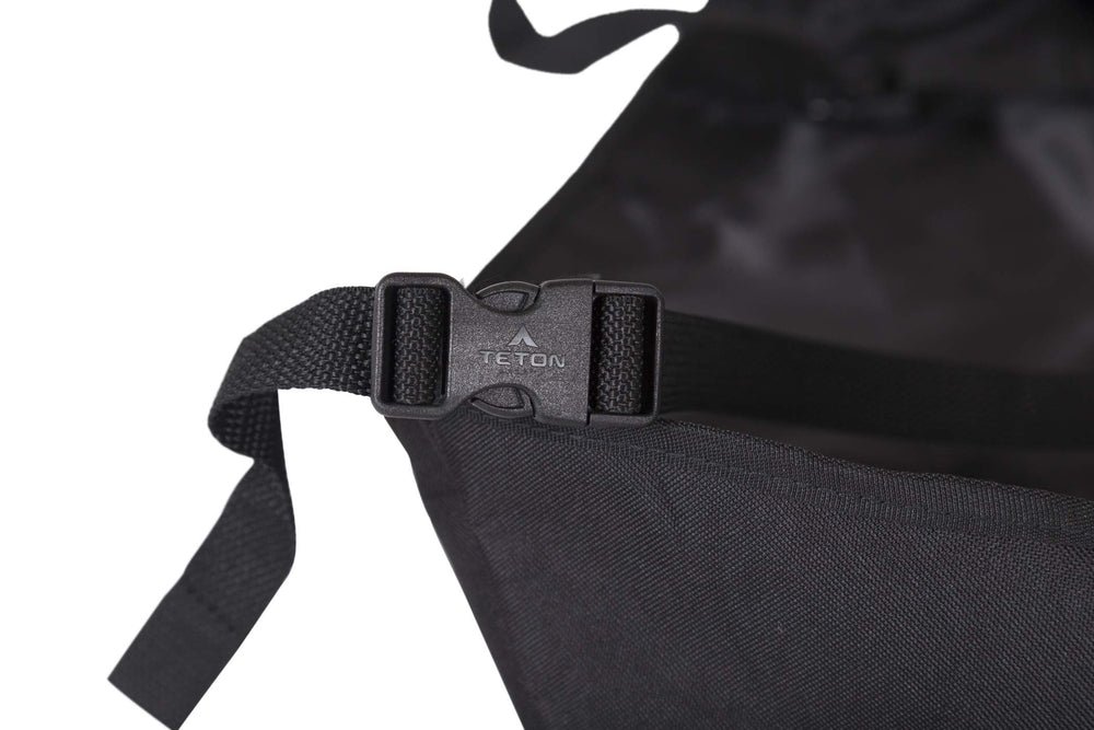 Teton Sports cot organizer pockets and fleece-lined sunglasses compartment for easy access.