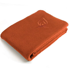 Texas Bushcraft merino blanket tent-use scene highlights warmth and versatility for camping.