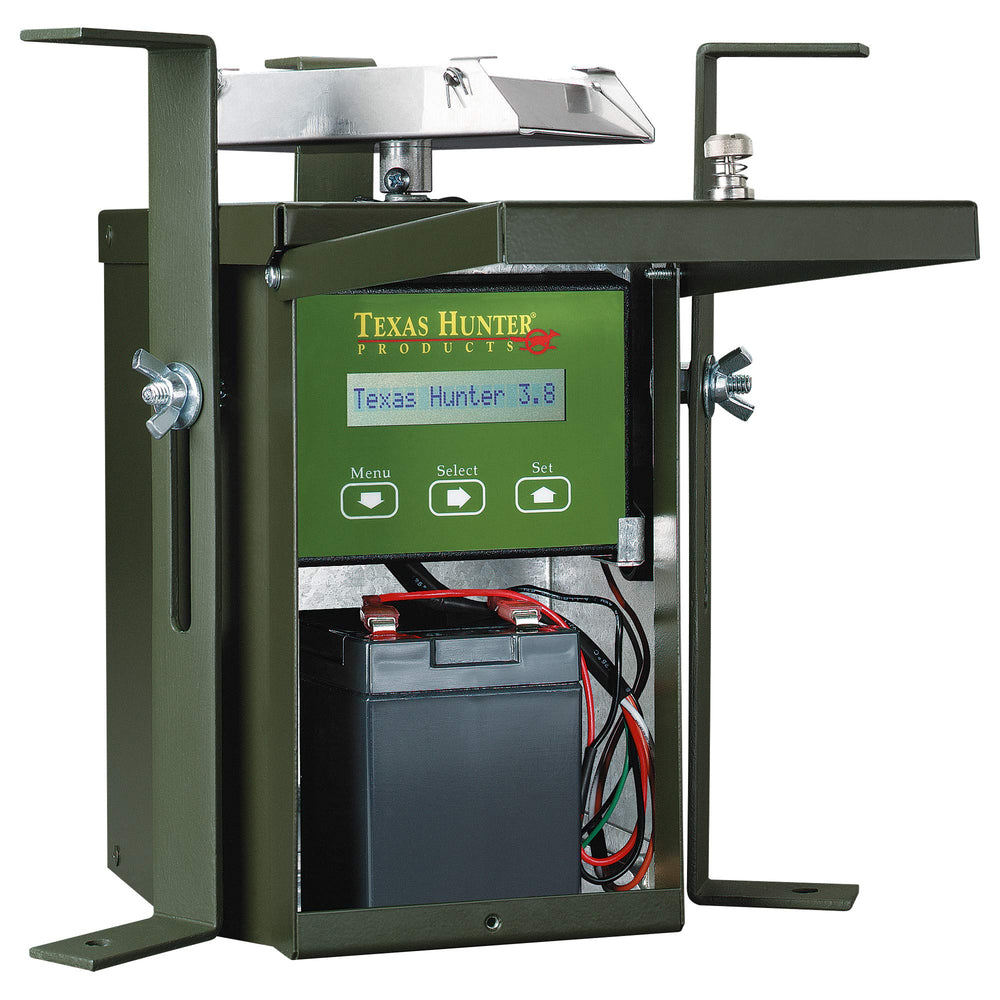 Texas Hunter TH70 feeder battery compartment highlights easy access for off-grid operation.