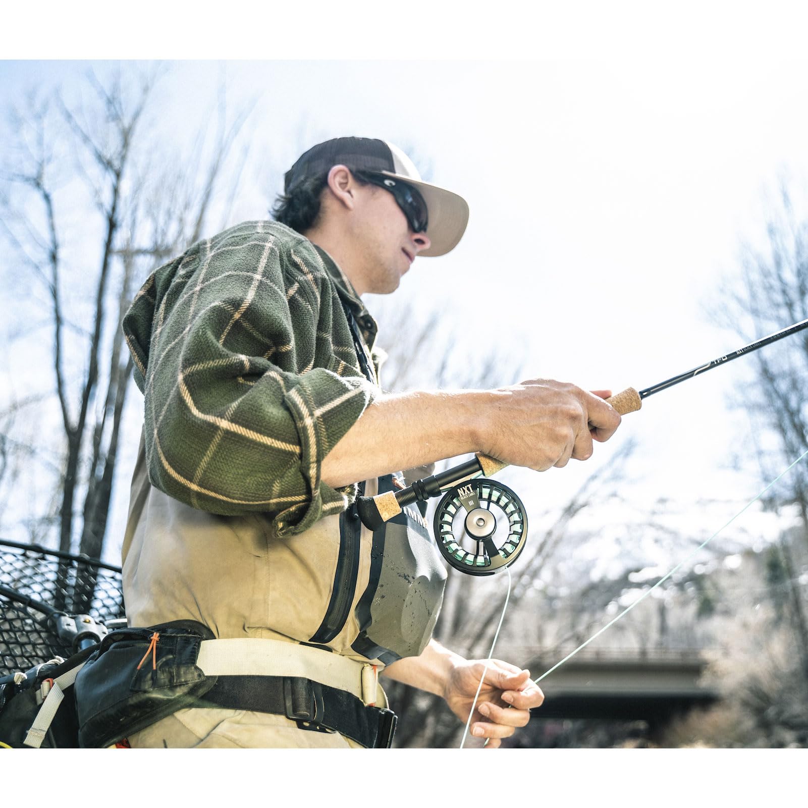 NXT Black Label Reel III with black neoprene pouch