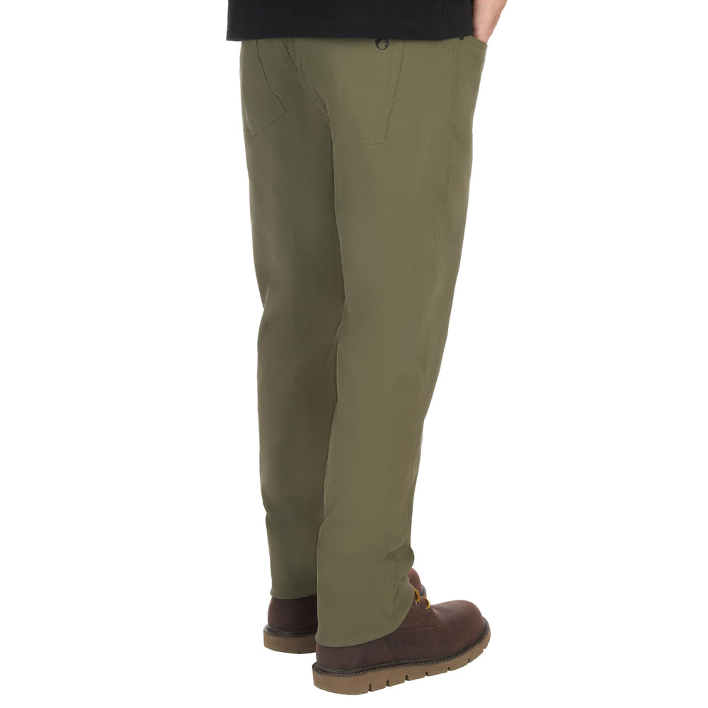 The American Outdoorsman men's 5-pocket stretch nylon pants travel-use image emphasizes quick-dry moisture-wicking comfort