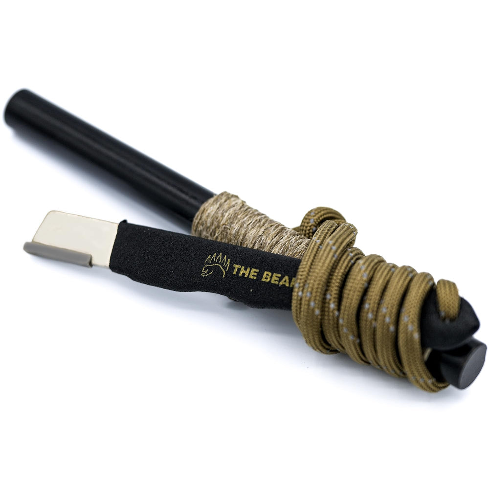 The Bear Essentials fire-starter kit packaging keeps gear neat and travel-ready.