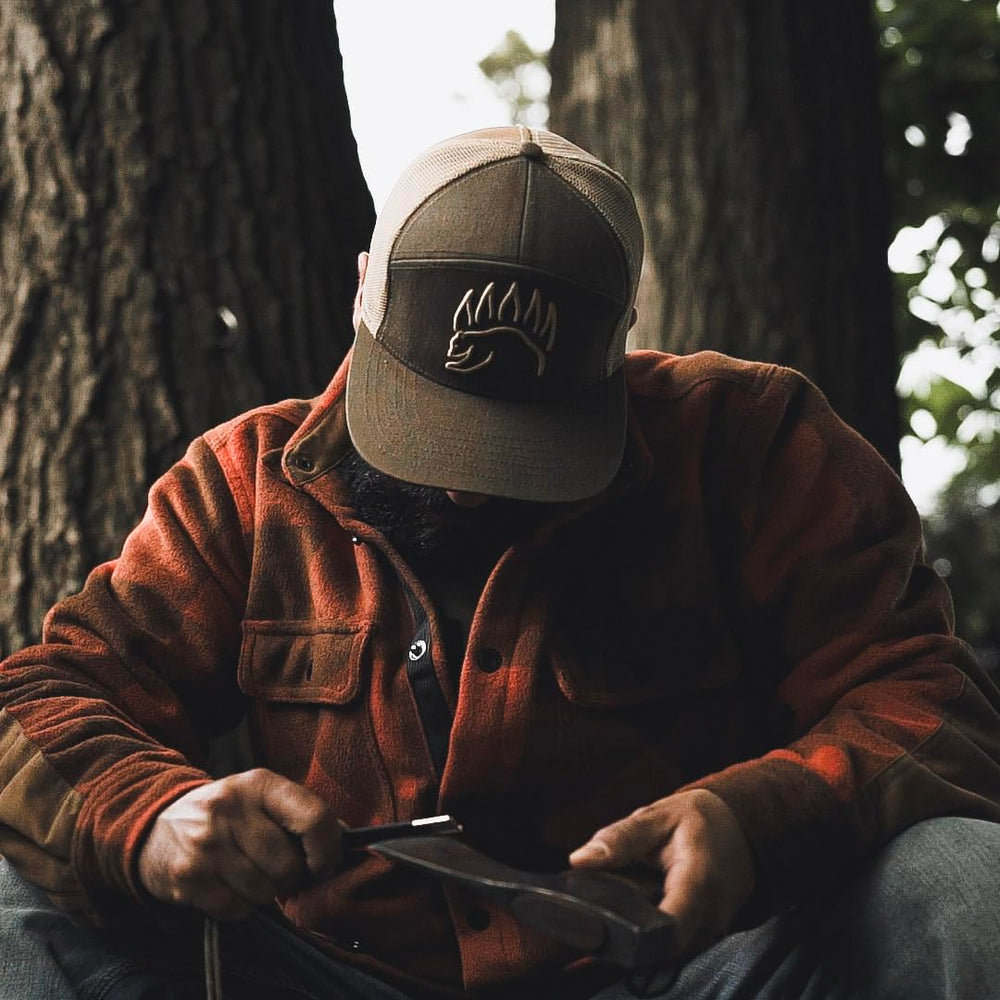 The Bear Essentials compact survival kit fits in pockets and packs easily.