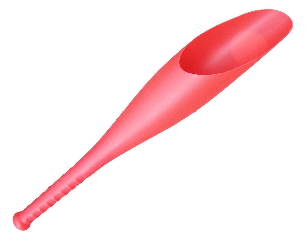 The Chum Bat bait thrower in red, floating on water