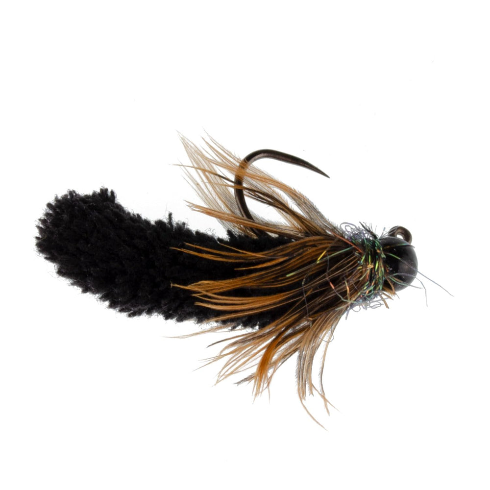 The Fly Fishing Place barbless jig mop fly promoting hookups on fast currents.