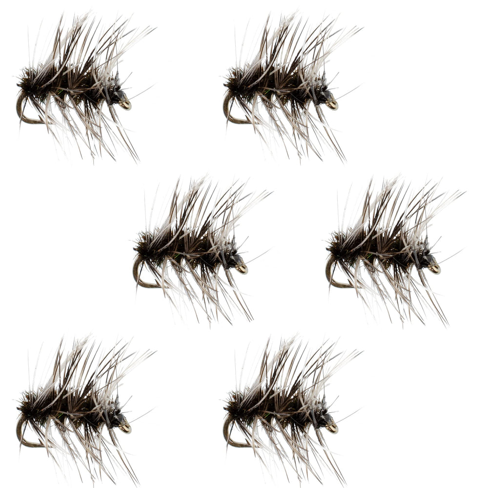 The Fly Fishing Place Griffiths Gnat dry fly perched on water, triggers trout rising behavior.