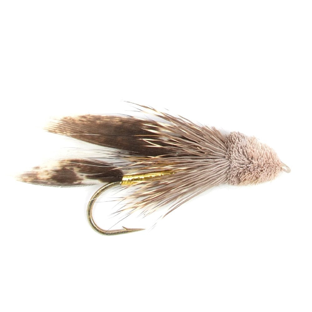 The Fly Fishing Place muddler minnow pattern shown on tackle display.
