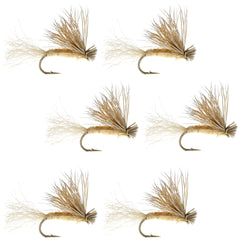 The Fly Fishing Place Tan X Caddis emerging dry fly resting on water surface.