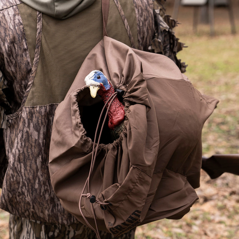 The Grind bag carries a harvested gobbler for easy field retrieval