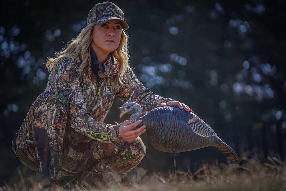 The Grind hen decoy heavy stake in-use provides stable setup in hard dirt.