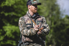 The Grind maple-top hickory-peg detail for versatile soft to long-range calls.